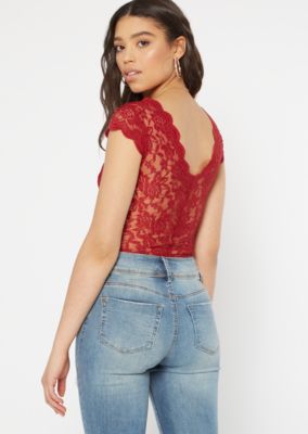 red bodysuit black jeans