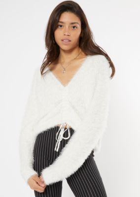 white fluffy sweater