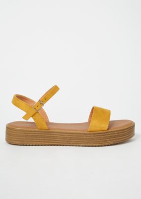 white flat platform sandals