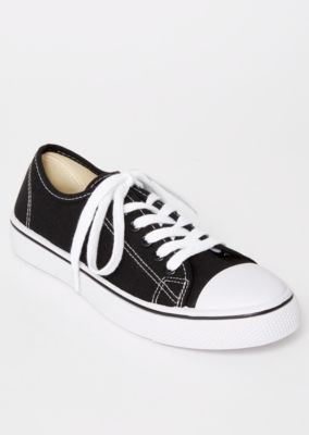 white canvas low top sneakers
