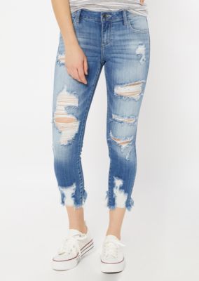 medium wash ripped skinny jeans