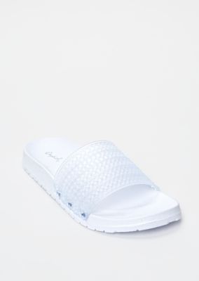 white jelly flip flops